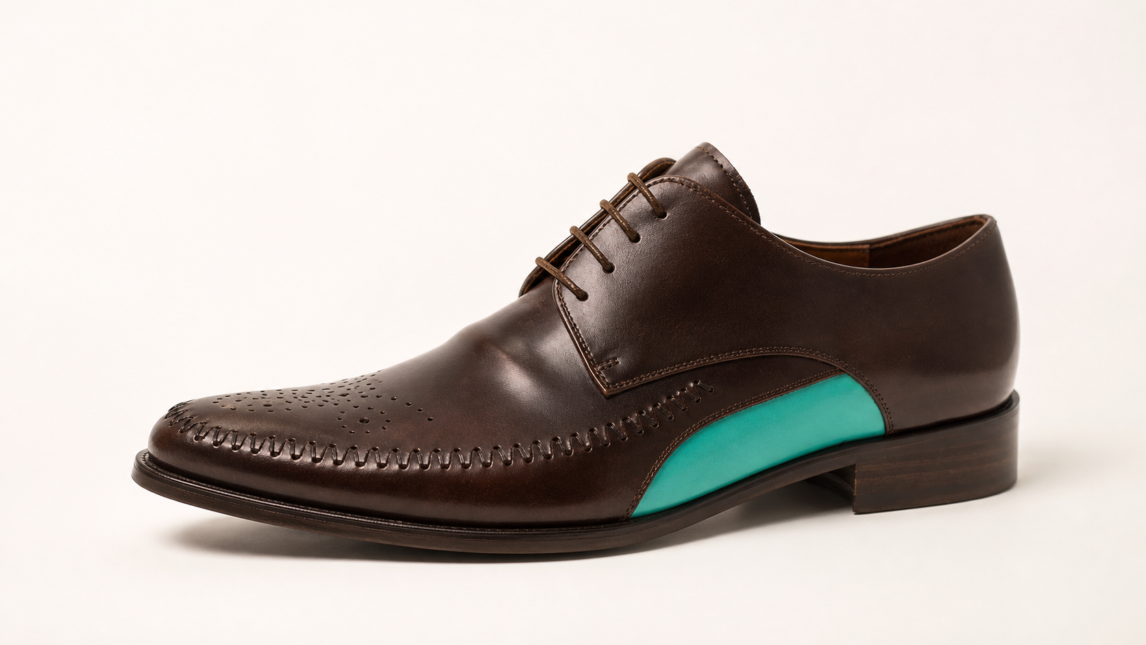 Walnut-brown handcrafted leather shoe with a turquoise Signature Line side accent
